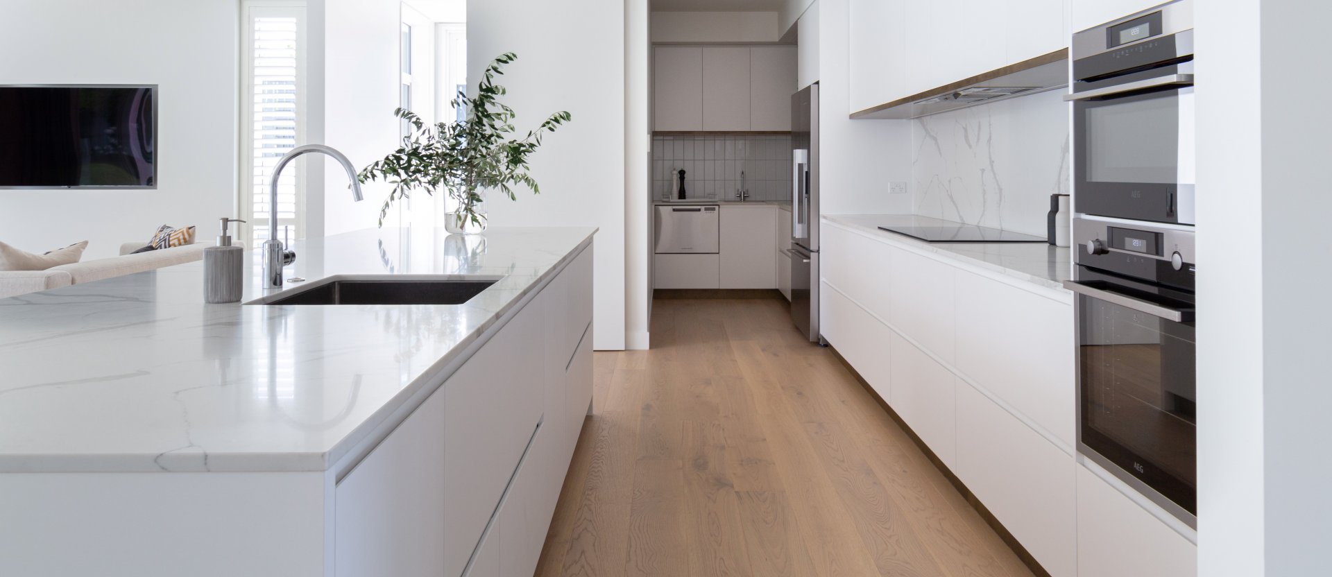Building Code changes to E3 and our solution to specifying wood flooring in kitchens and other wet areas